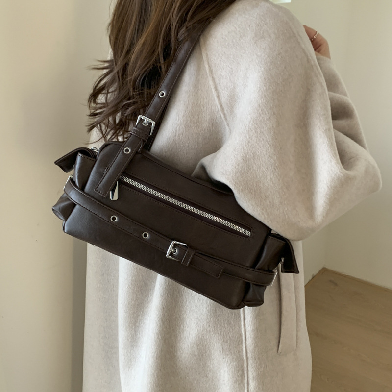 Bolso de viaje coreano para mujeres 2025 nuevo otoño invierno de alta sensación de hombro bolso de braza retro versátil bolso de mano