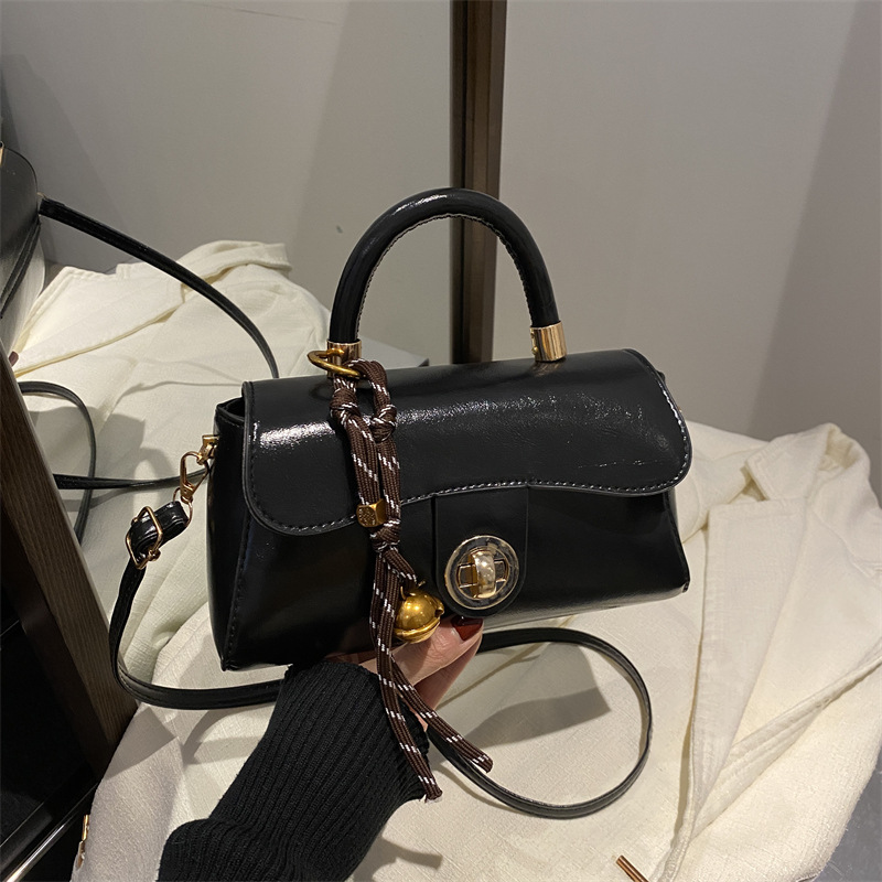 Retro simple bolso de mujer 2024 otoño invierno nuevo bolso de mano cuadrado de estilo exterior versátil alta textura mochila