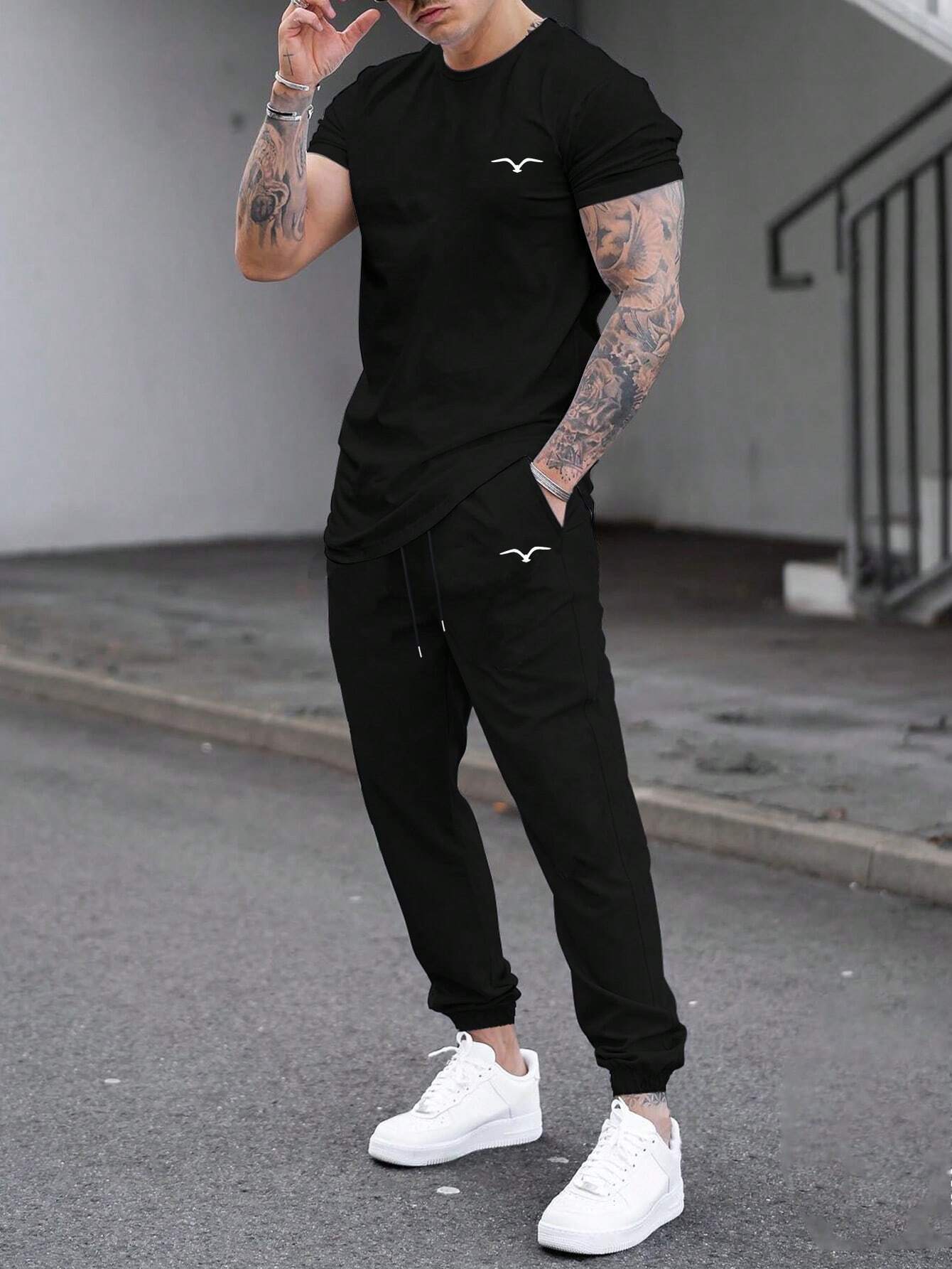 Pantalones de camiseta de manga corta simple de alta calidad para hombre 2024 nuevo producto suelto y cómodo juego de ME13 ML4