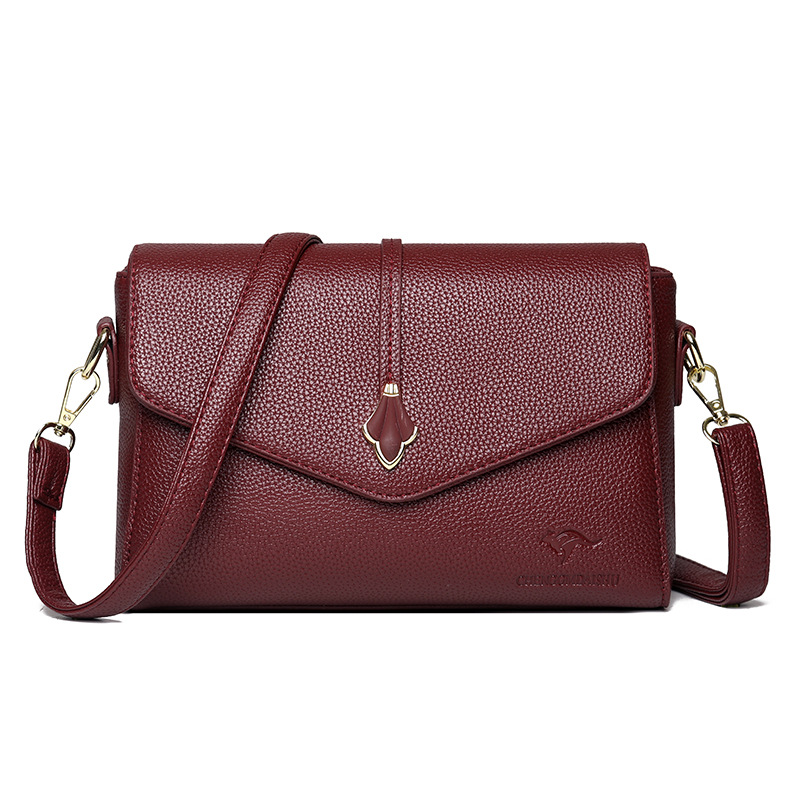 Bolso de moda para mujeres 2026 nuevo bolso pequeño de cuero suave bolso de madres de mediana edad bolso de hombro de gran capacidad bolso de mochila