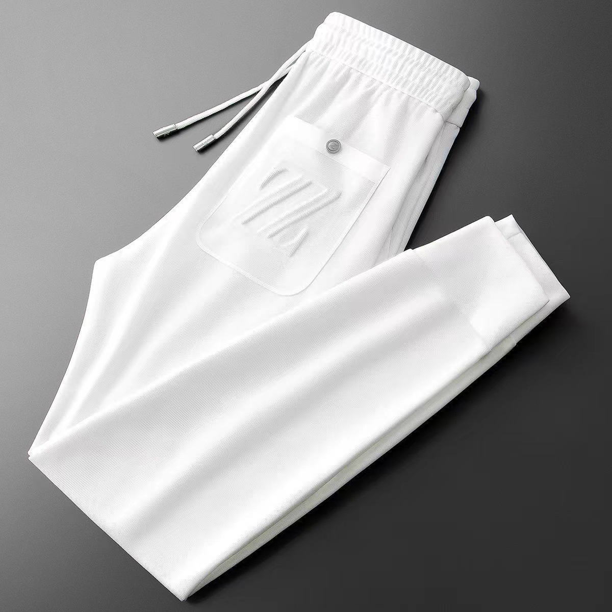 Herrenbekleidung Freizeithosen für Männer dünne Strickstickerei gepresster Kleber dreidimensionaler Modetrend All-Match-Sport-Slim-Fit-Jogginghose für Männer_voghion.com