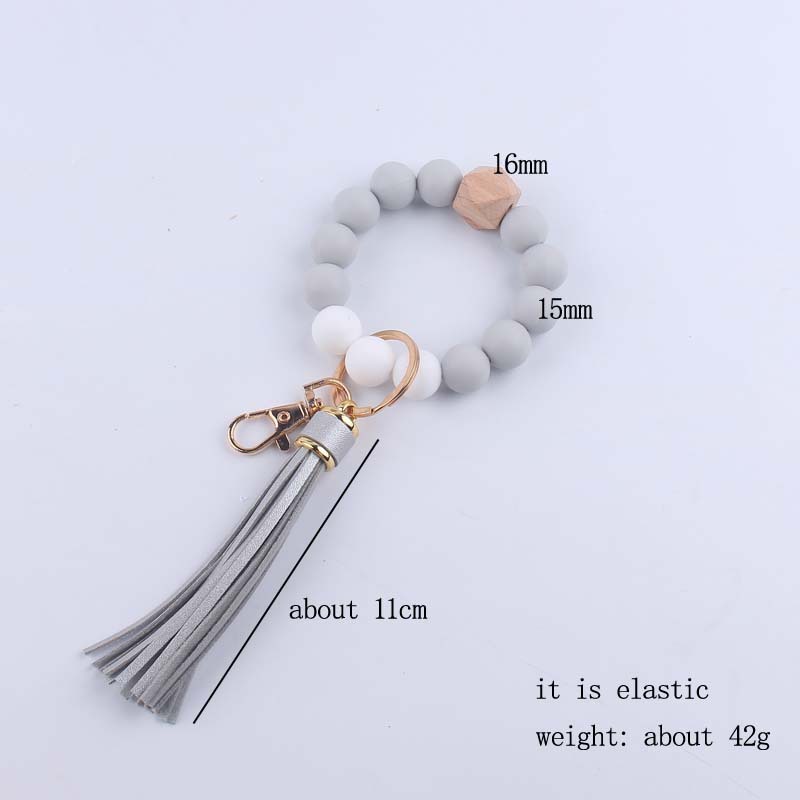Pulsera de silicona pulsera llavero nuevo creativo DIY borla colgante contraste color