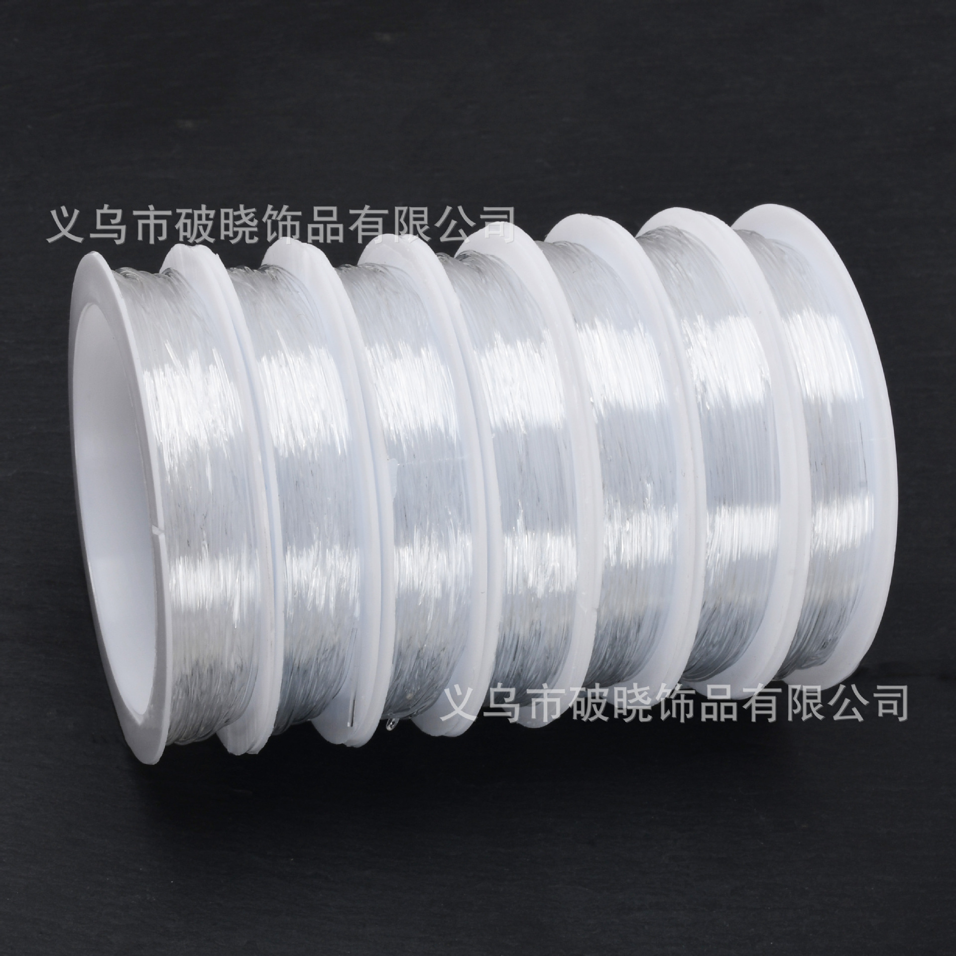 Línea de cristal transparente línea elástica con cuentas de alambre DIY línea de joyería hecha a mano etiqueta amarilla fabricante de etiqueta azul en stock image 4