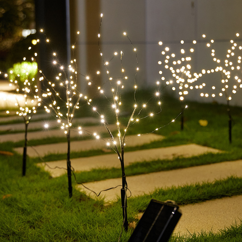 Outdoor LED solar copper wire lights for Christmas holiday garden lawn landscape tree branch decoration, creating a festive atmosphere