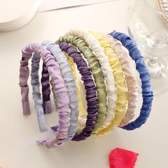 Korean-style plain-color hairband for girls, wholesale headwear—internet-famous, cute wash-face headbands in pleated cream-colored satin, perfect for women.