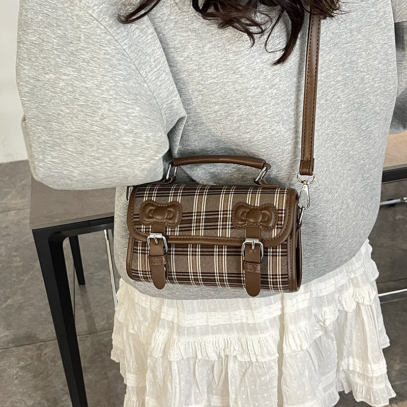 2025 otoño y invierno nuevo estilo británico bolso de mano casual versátil bolso de hombro a rayas bolso de viaje coreano