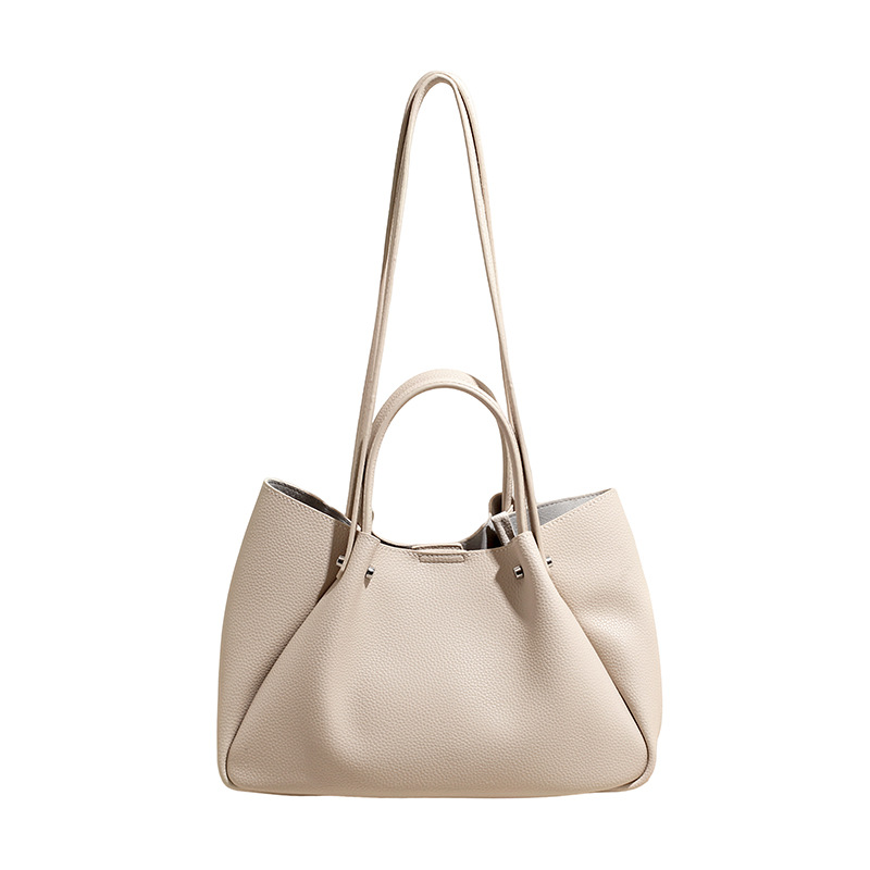 Bolso coreano nicho bolso de brazo bolso de mujer 2026 nueva gran capacidad de transporte universal bolso de hombro