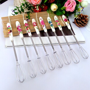 Cross-border creative ceramic handle manual egg beater stainless steel egg beater egg beater portable kitchen baking gadgets