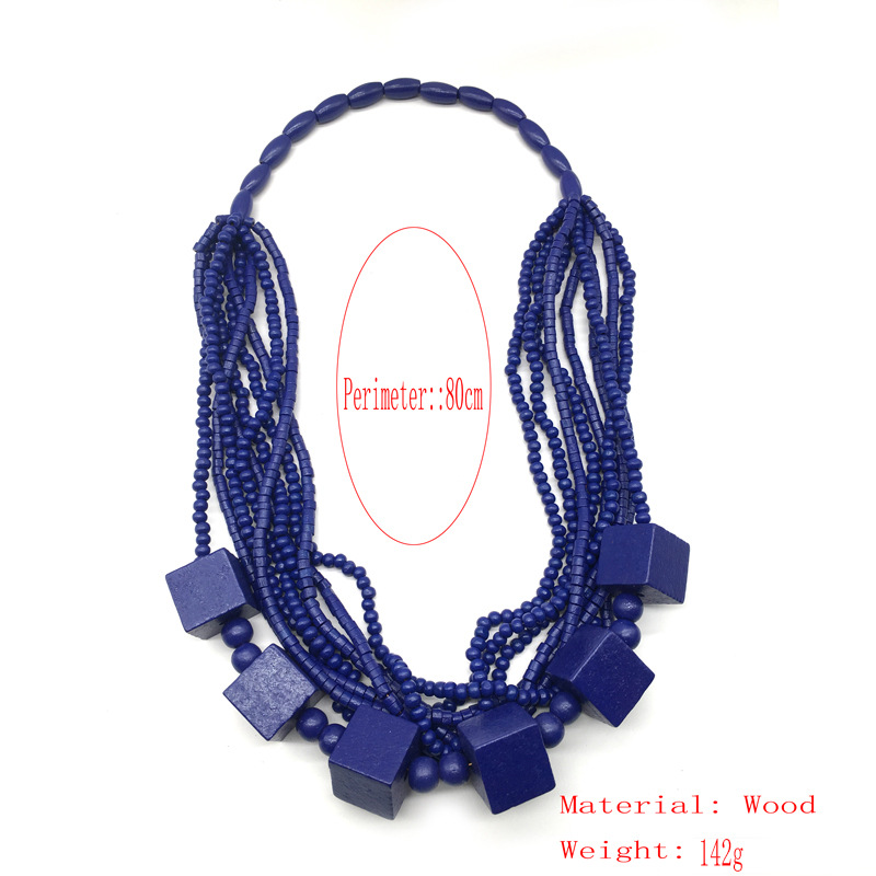 Collana lunga a strati con perle geometriche in legno donna_voghion.com