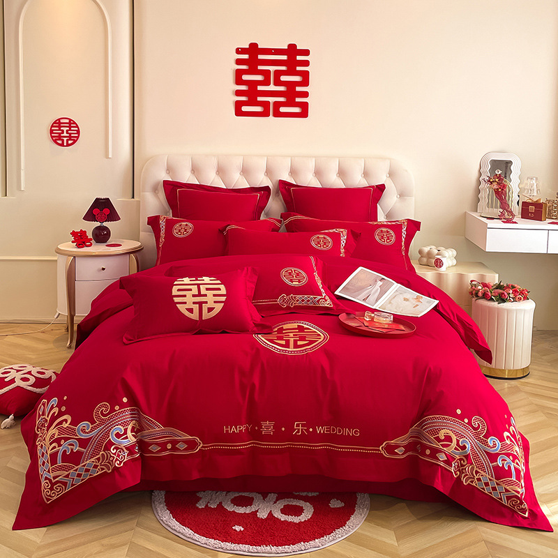 Una clase de madres y bebés de algodón de boda cuatro piezas grandes sábanas bordadas rojas chinas cubierta de cama de boda