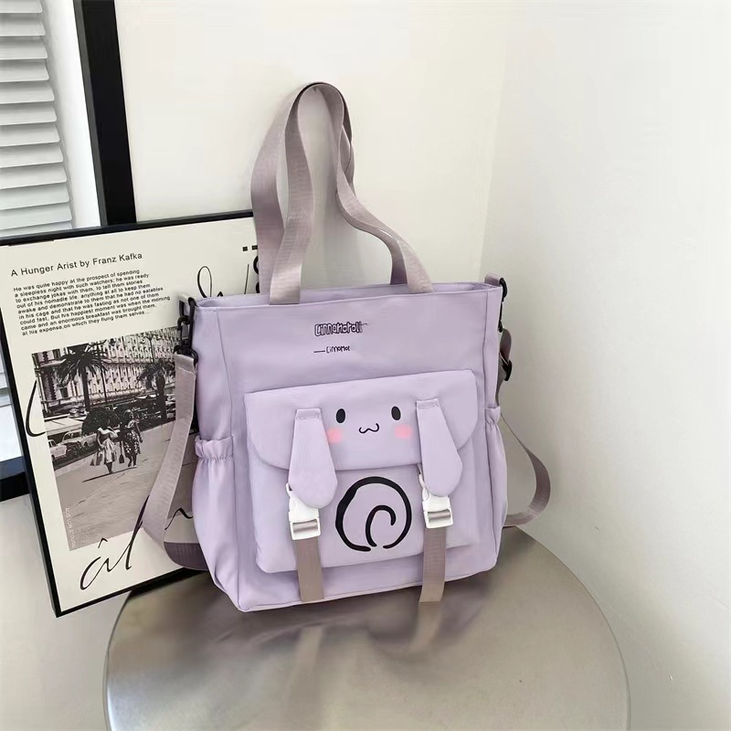 2024 estudiantes bolso de estilo explosivo simple y de gran capacidad nuevo bolso de mensajero de un solo hombro de moda para mujer bolso de viaje