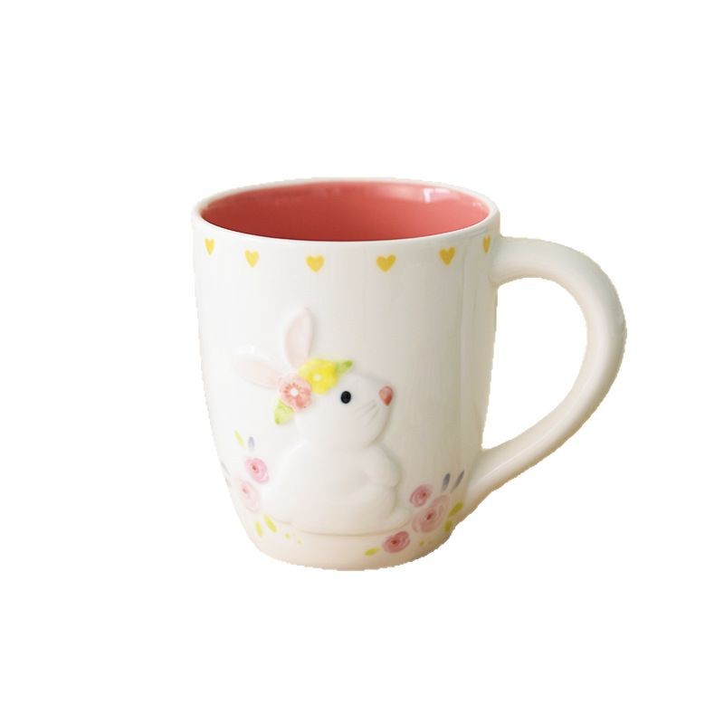 Inventario encantador nórdico conejo taza de agua de cerámica doméstica flores de conejo taza de desayuno de leche de doble cara