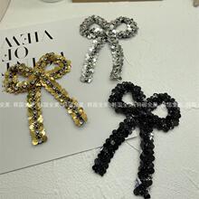 欧洲站欧货2024年秋冬新品金色手工钉珠银色蝴蝶结手工串珠贴图