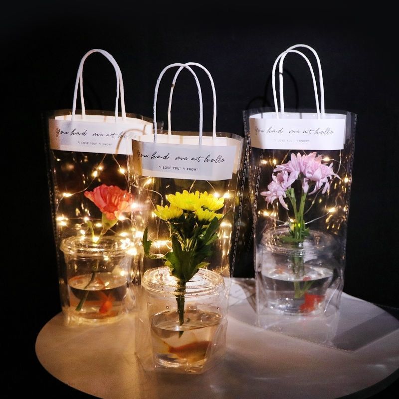 Taza de flores de paquete único Día del Maestro Festival Qixi bolsa de flores transparente portátil hecha a mano conjunto completo de bolsas de regalo de mercado nocturno