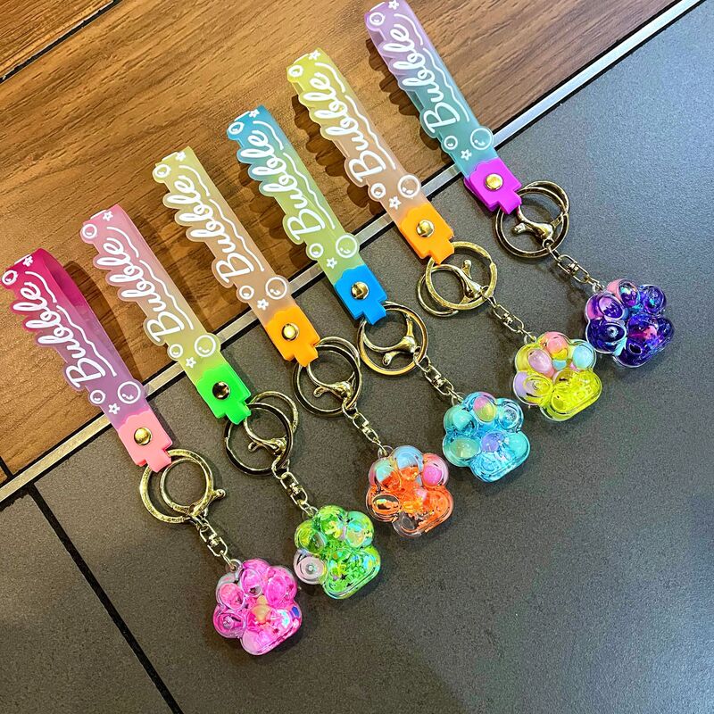 Glow-In-The-Dark Cute Cat Paw Keychain Oil Bottle Quicksand Paw Ornament Crystal Keychain Backpack Car Pendant Glow-In-The-Dark Cute Cat Paw Keychain Oil Bottle Quicksand Paw Ornament Crystal Keychain Backpack Car Pendant