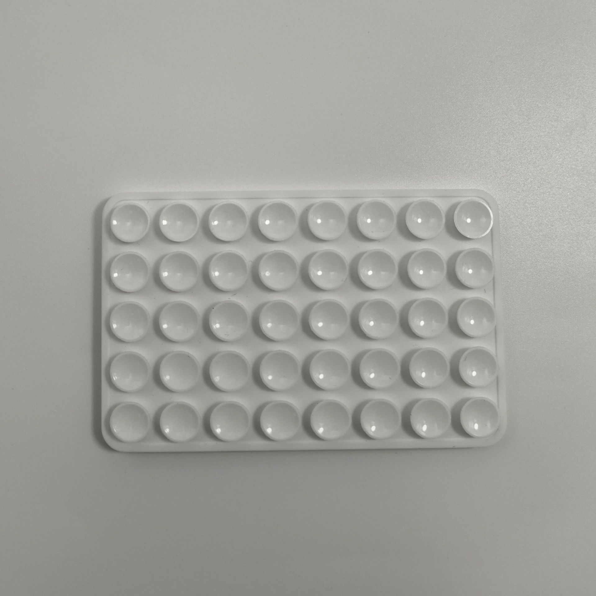 Suministro directo de fábrica de ventosa de silicona ventosa de teléfono móvil ventosa cuadrada ventosa de 24 granos ventosa de soporte para teléfono móvil ventosa de silicona de doble cara