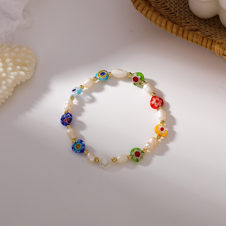 Linda Pulsera Ajustable Elástica Hecha A Mano Con Flores De Perlas De Colores display picture 2