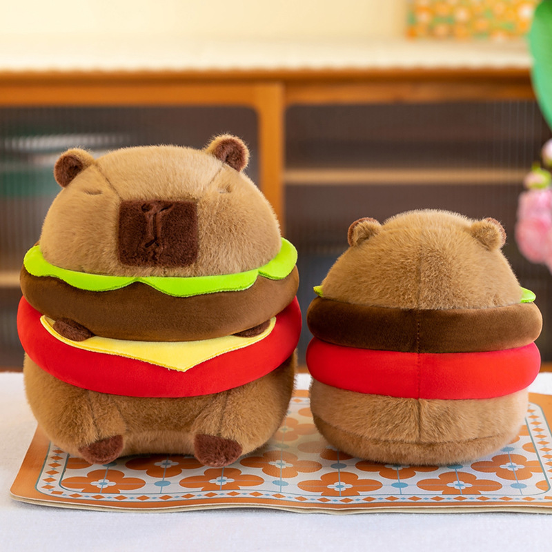 カピバラ人形ハンバーグカピバラぬいぐるみピンクのリュックサックのぬいぐるみが寝ているぬいぐるみがプレゼントされます。|undefined