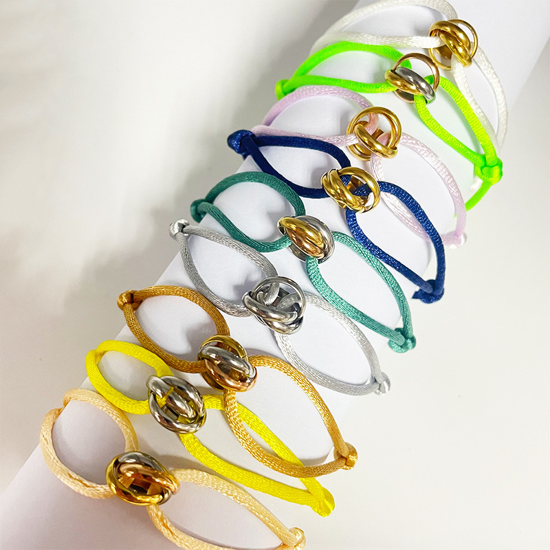 Cross-border supply foreign trade hand-woven couple stainless steel hand rope three-color three-ring hand rope adjustable bracelet