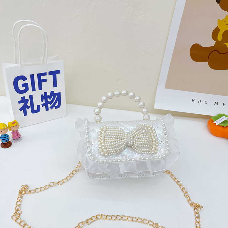 Bolso bandolera de moda de un solo hombro nuevo estilo niña estilo occidental perla portátil mini lindo bolso de perlas de un solo hombro