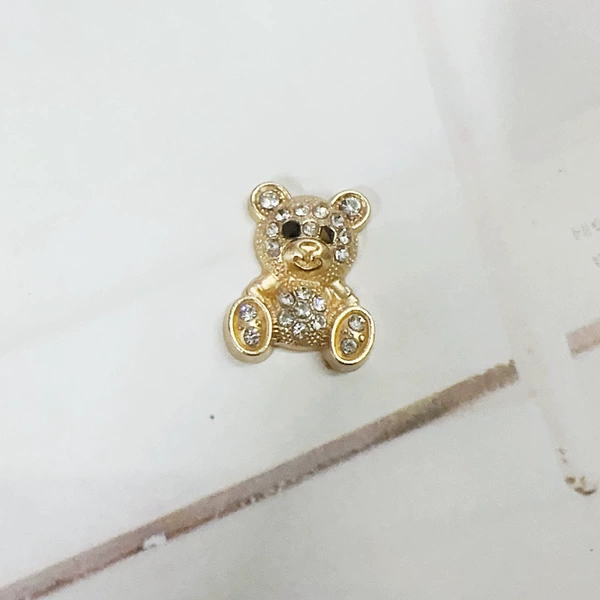 Golden, diamond encrusted, with little bears