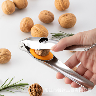 Yangjiang factory smiley face chestnut walnut opener cross seam cutting cone automatic rebound clamping chestnut opener