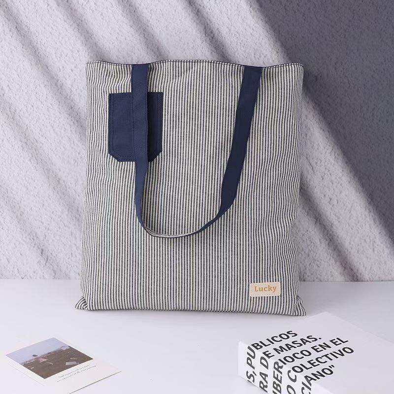 Special offer double-sided canvas bag, shoulder bag, commuter tote canvas bag, cross-border simple canvas bag, customizable with logo Special offer double-sided canvas bag, shoulder bag, commuter tote canvas bag, cross-border simple canvas bag, customizable with logo