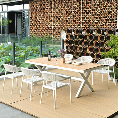 Mesa y silla al aire libre de tela de caña combinación de patio de hotel terraza jardín balcón café tela de caña mesa y silla de lujo al aire libre