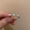 Ring with stone pearl with zircon