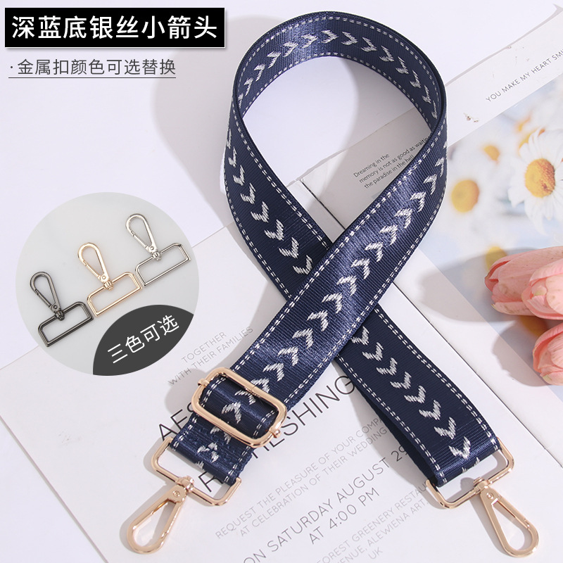 Small silver arrow on dark blue background
