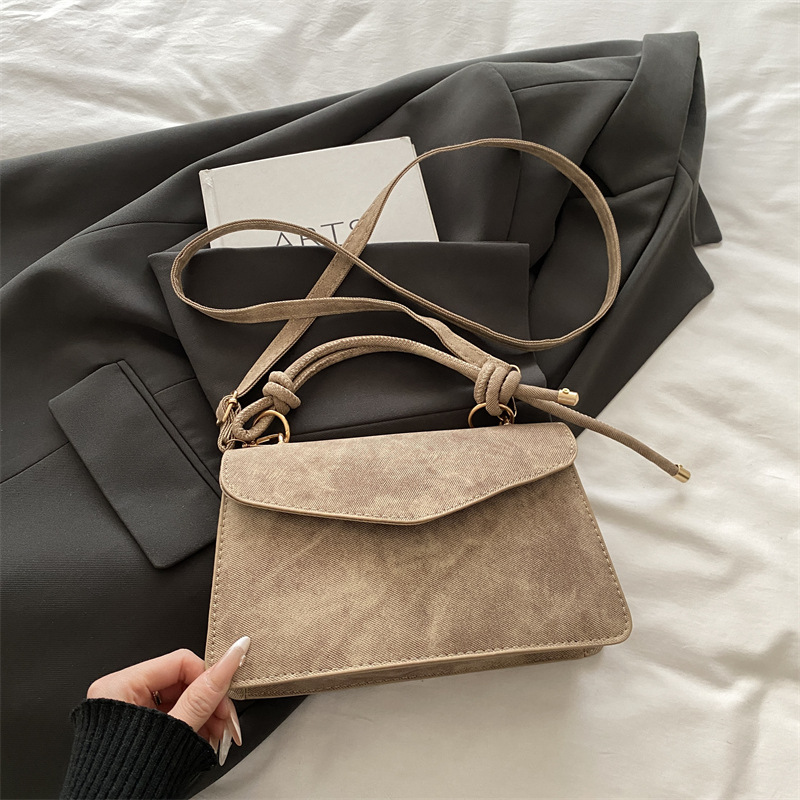 Bolso público pequeño para mujeres 2026 nuevo bolso cuadrado de alta calidad sensación de diseño retro bolso de hombro simple bolso de mano
