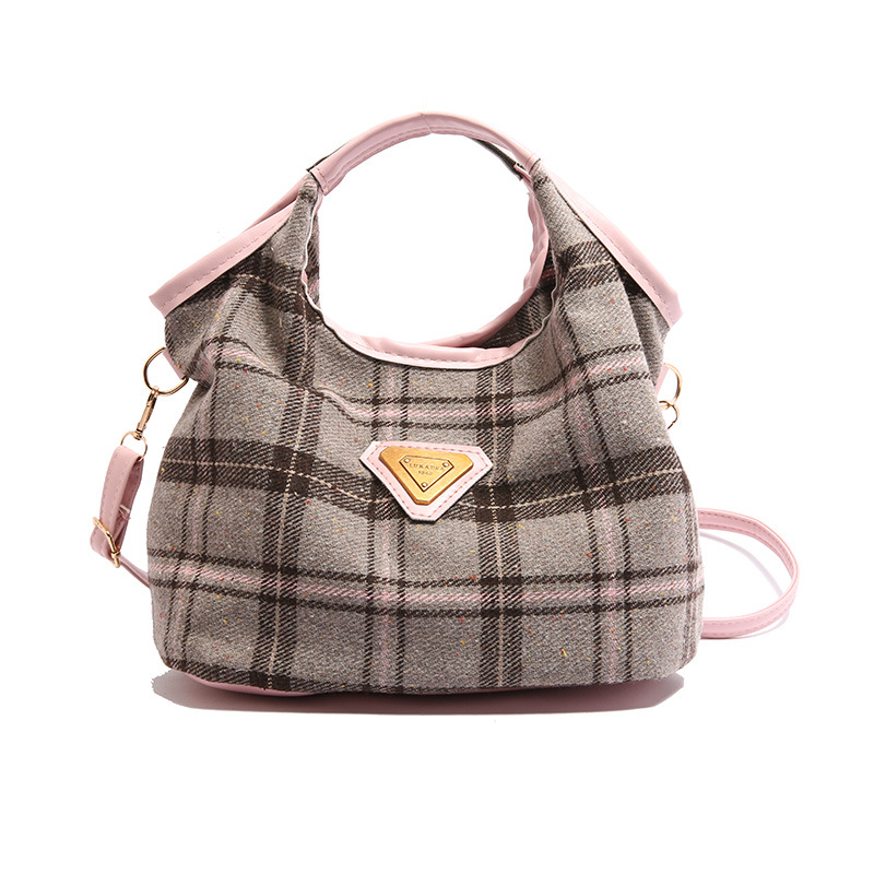 Bolso de mano de textura para mujeres 2024 otoño y invierno nuevo estilo retro de moda empalme de gran capacidad de viaje de hombro bolso de mujer