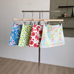 夏日海边A绝美活力字半身裙女感油画印花低腰度假时尚包臀裙风潮