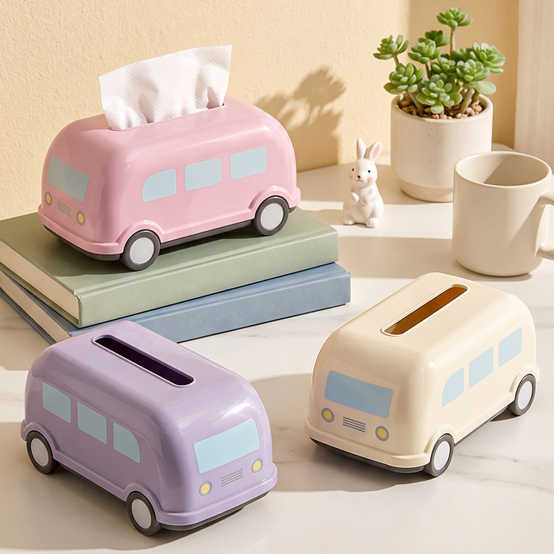 Creative bus-shaped tissue box for home use, suitable for living room coffee tables and desktops; a cute little car design with a spring-loaded lift mechanism for easy access Creative bus-shaped tissue box for home use, suitable for living room coffee tables and desktops; a cute little car design with a spring-loaded lift mechanism for easy access