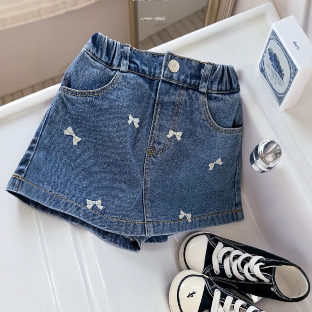 Ropa infantil coreana nueva falda de mitad primavera y verano niñas bordadas con arco lavado con agua vaquero estilo extranjero en forma de A falda de mitad