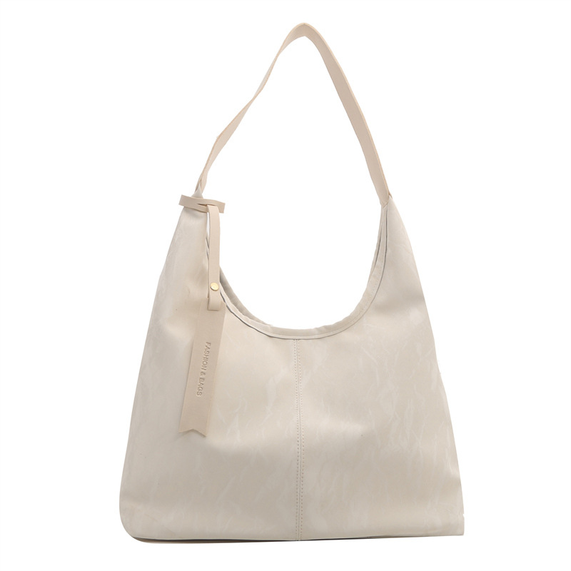 Bolsa de estilo extranjero para mujeres, primavera y verano 2024, nueva bolsa de hombro de dama versátil, bolsa de estilo coreano de alta calidad para mujeres