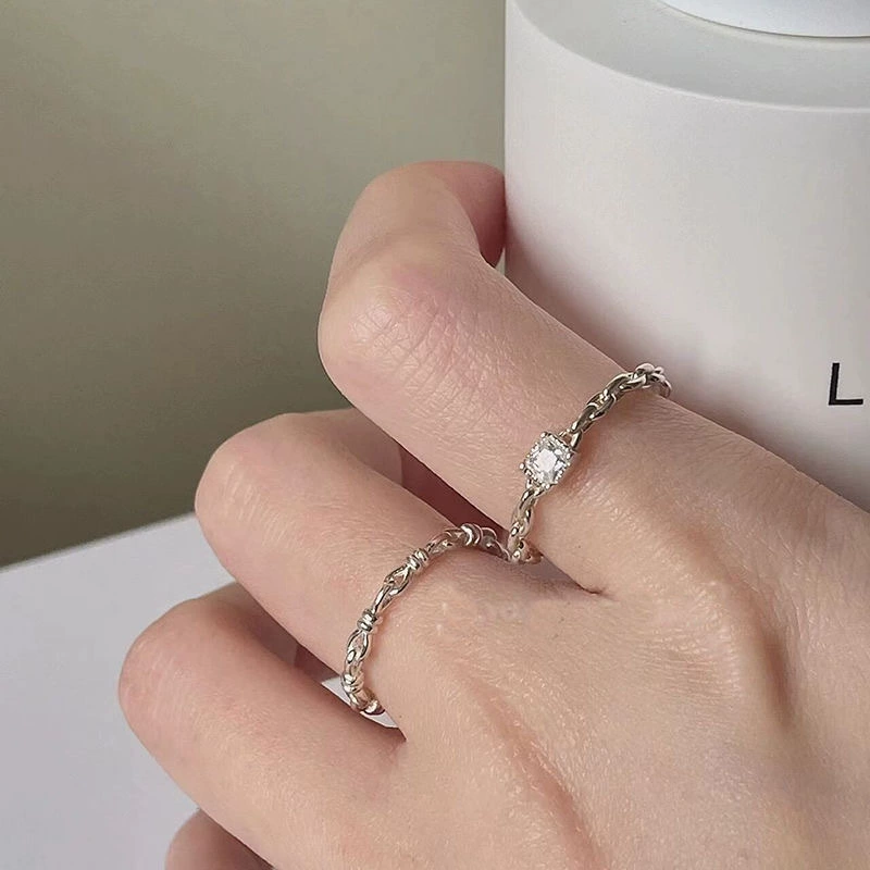 Adjustable small design zirconium, brand sophisticated ring with stone, on index finger