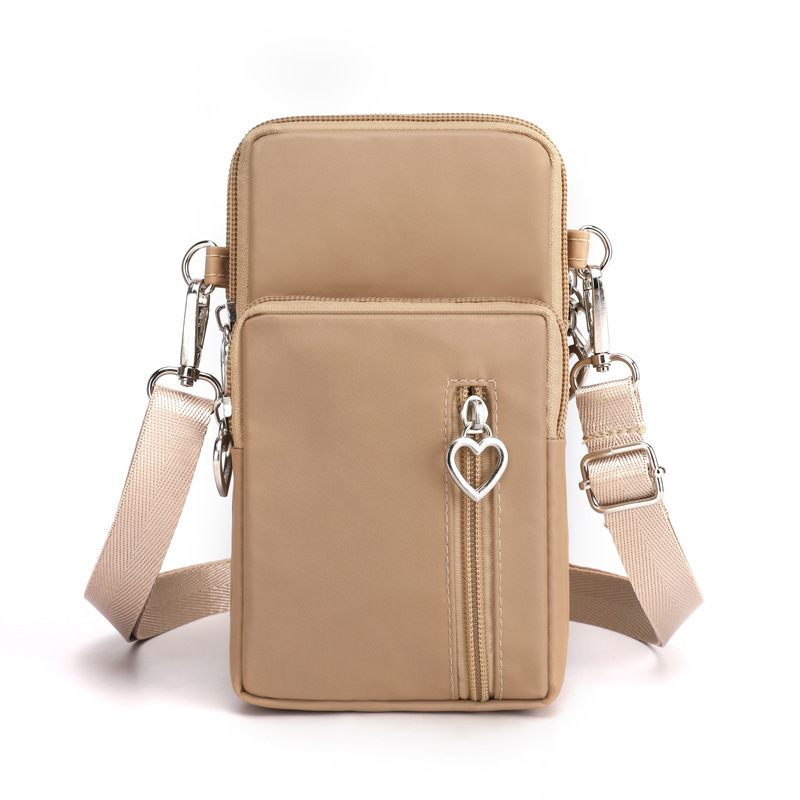 Venta al por mayor transfronteriza 2022 nuevo bolso de teléfono móvil crossbody de las mujeres monedero bolso de la muñeca bolsa de brazo deportivo bolsa de tela crossbody