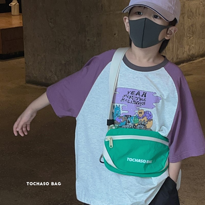 Moda coreana popular para niños y niñas bolsas de cintura letras extranjeras bolsas de mochila para bebés 2026 nuevo bolso de cambio para niños
