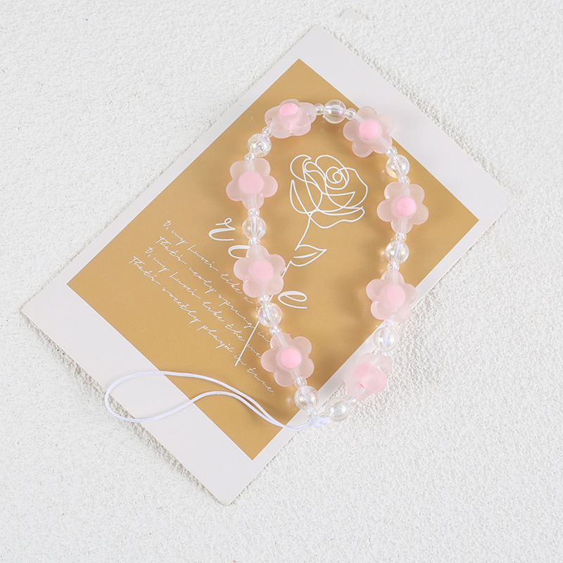 Flor cordón DIY teléfono móvil Shell cadena hecha a mano con cuentas fresca pequeña flor colgante cadena joyería decorativa cadena colgante