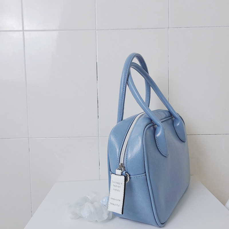 Design di nicchia coreano con la stessa borsa color crema e una borsa elegante, borsa quadrata con croce diagonale a spalla singola_voghion.com