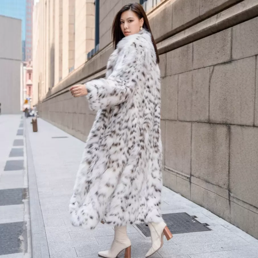 山猫皮草女2025秋冬季新款外套加长款西装领时尚纯白仿狐狸毛大衣