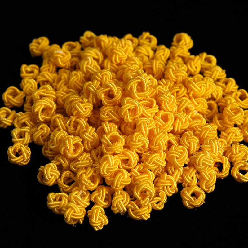 Venta al por mayor piña hebilla DIY material hecho a mano piña nudo chino nudo accesorios 6mm nylon piña nudo bolsa hebilla
