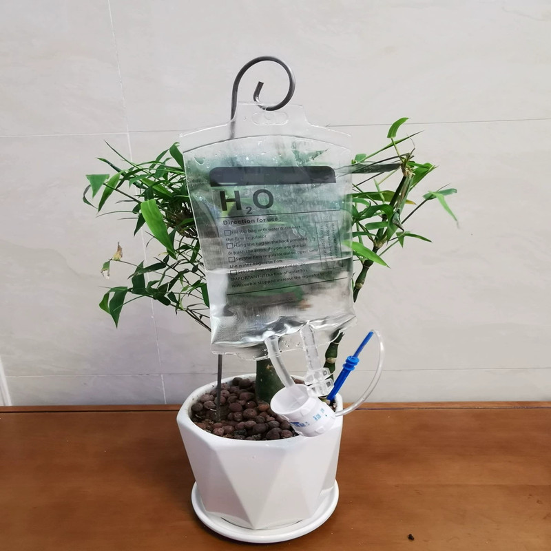Lazy potted plants watering drip irrigation automatic drip watering device irrigation flowers and plants drip bag timing drip factory