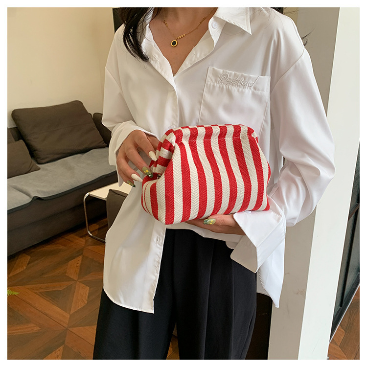 New cross-border fashion color-blocking striped cosmetic bag, women's loose change mobile phone storage bag, trendy and niche cloud clutch undefined