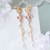 Brand asymmetrical elegant earrings, Japanese and Korean, simple and elegant design, flowered, wholesale