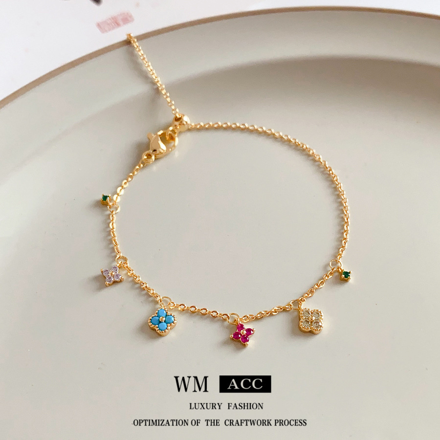 Pulsera de borla de flor de trébol de circonita Pulsera dulce de lujo ligero, de alta gama, joyería de moda de nicho al por mayor