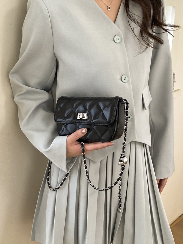 Bolso de cadena de diamante popular bolso de mujer 2026 nuevo estilo de alta calidad humedad moda de color sólido con cierre bolso de hombro