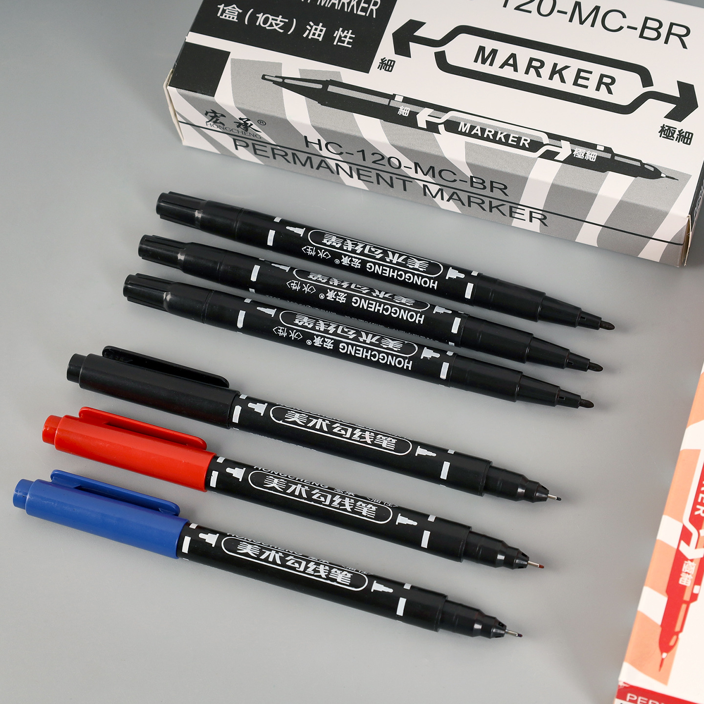 Oily small double-headed marker children's drawing Goulianbi black red blue can't wipe off the quick-drying marker stationery wholesale