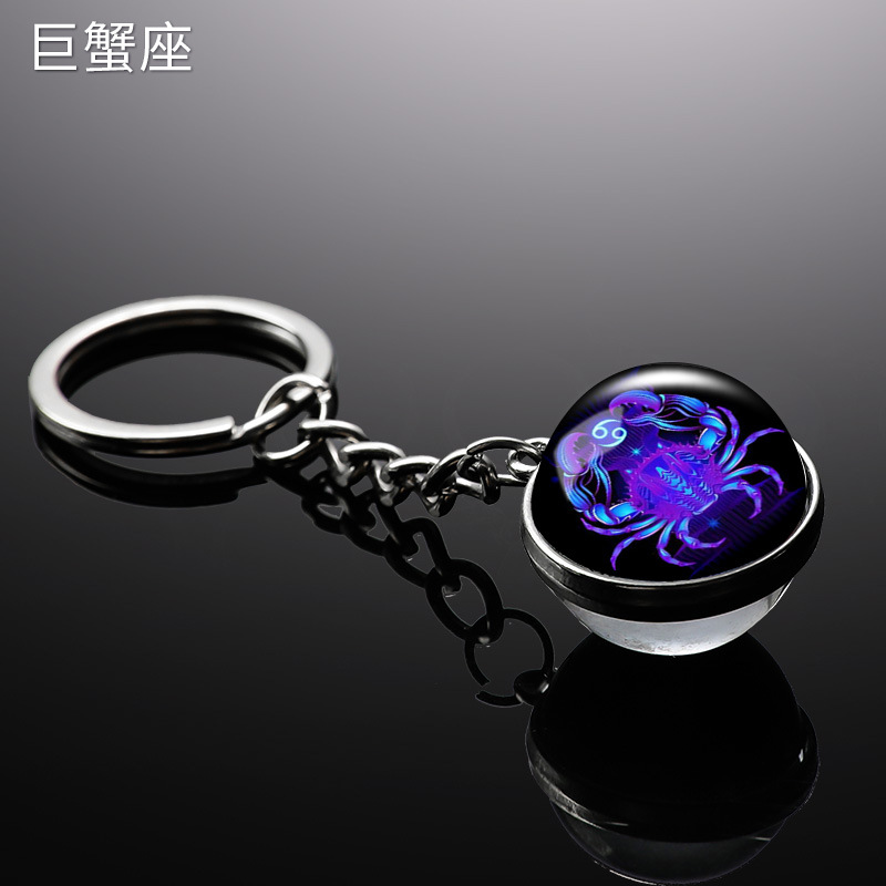 Transfronterizo 12 constelaciones de luz nocturna bolsos colgantes de bolsas de joyas de tiempo doble cara bola de vidrio llavero al por mayor